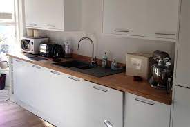 An Innova Carrera Painted White Modern Kitchen White Modern Kitchen Diy Kitchen Kitchen Concepts