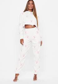 The official site for playboy clothing, lingerie, hats and more. Missguided Cotton Playboy X White Repeat Print Slim Joggers Lyst