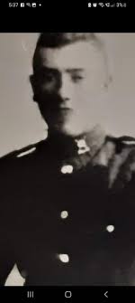 This is a photo of my Grandfather James M. Thomas. I believe he came to the  Island as a guard at Knockaloe Internment Camp and was in the Royal Defence  Corps. can