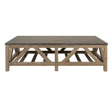 A checkerboard of smooth surfaces and incised lines, the rectangular stone block top is poised on a black oak plinth base. Rustic Relaxation Rustic Style Living Room Design Ideas