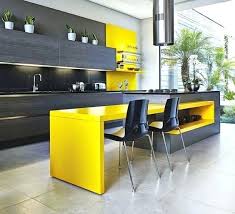 Grey And Yellow Kitchen An Ultra Modern Kitchen With Dark Grey Cabinets And A Yellow Kitchen I Yellow Kitchen Designs Kitchen Design Color Contemporary Kitchen