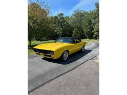 Image result for Canary Yellow 1967 AC Cars