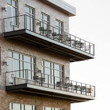 In this case, stainless steel clamps can be used for attaching glass panels to the railing system. Forward Bank Railing System Marshfield Wi Keuka Studios