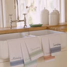 Create a beautiful hanging hand towel for the kitchen using holiday or decorator fabrics and huck cloth. Creative Options For Hanging Kitchen Towels