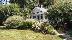Early ranch style homes started cropping up in the 1930's and became much spoiler alert: 35 Foundation Plants Landscaping Shrubs For Front Of House Pictures