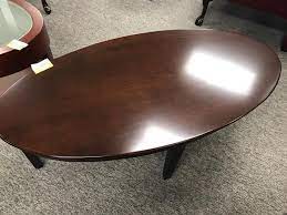 This table boasts sturdy wood with a pleasing espresso finish and a distinctive beveled glass top. Espresso Coffee Table Richmond Office Interiors