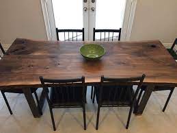 live edge black walnut dining table with 1x3 metal trapezoid legs 100 canadian made locally owned lo dining table live edge dining table walnut dining table