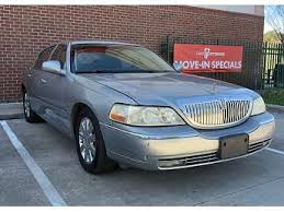 Image result for Light Ice Blue 2006 Town Car