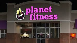 planet fitness showing some muscle and breaking out on