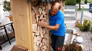 Sichtschutz Aus Brennholz Fur Eine Terrasse In 2020 Sichtschutz Garten Sichtschutz Garten Holz Holzwand Garten
