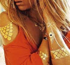 Permanent metallic ink has been popular for quite some time and there is no question that the results that you get with a tattoo are amazing. Gold Tattoo Ink All Questions Answered Tattooswin