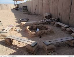 Maybe you would like to learn more about one of these? A Fire Pit Surrounded By Makeshift Benches Used By Mentoring And Reconstruction Task Force 1 Australian War Memorial