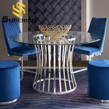 The pedestals could also be used to support two round glass table tops. China Cheap Price Round Glass Dining Table With Stainless Steel Base China Restaurant Table Dinner Table