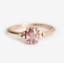 A Beautiful Pink Stone With Small Side Diamonds In A 14k Yellow Gold Setting Pink Sapphire Ring Peach Sapphire Engagement Ring Peach Sapphire Rings