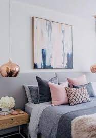 A brilliant option for bright and airy bedrooms, this shade prevents the space becoming stark and provides a soft backdrop for a mix of original arts, crafts and retro details. Image Result For Navy Blue Pink Grey Copper Bedroom Greybedroomwithpopofcolor Home Decor Bedroom Bedroom Interior Gold Bedroom
