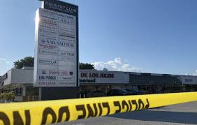 The scene of a fatal shooting at the entrance of the billiards banquet hall in miami gardens, fla. Bozhcsfbpixzim