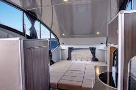 This total set up is perfect for those who like to have a cozy sleep after having an outdoorsy day. The R 1713 Features A King Size Bed Teardrop Camper Teardrop Camper Interior Teardrop Trailer