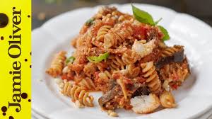 Choose chunky pasta shapes like penne or farfalle to trap the sauce, and serve with lashings of grated parmesan cheese. Jamie S Aubergine Tomato And Ricotta Pasta Video Jamie Oliver