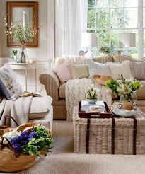 This decor employs dangling lights to illuminate a grey . Neutral Living Room Ideas Neutral Living Rooms Neutral Colour Scheme