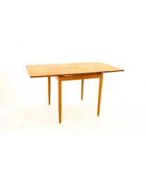 In this video we highlight the construction and design of a dining table that has a hidden recessed board game area.subscribefollow @mrmattwoodworkslike face. Mid Century Small Teak Hidden Leaf Dining Table