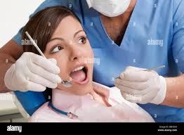 Oral exam not dentistry hi-res stock photography and images
