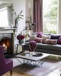 A herringbone detail adds a sense of subtle elegance to this living room fireplace by r.p. 10 Cosy Living Room Ideas For Your Home