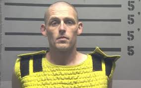 Watch as man fires shot into Madisonville Police door