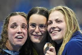 Kaylee McKeown still rules the Olympic backstroke, beating Regan Smith in  women's 100 meters