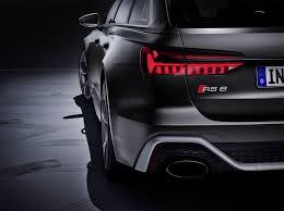 The rs 6 avant rs tribute edition pays homage to the rs 2 with its silver wheels, black roof rails, nogaro blue exterior paint, body color mirrors, red brake calipers, rs sport exhaust, black optic package, and a variety of audi exclusive interior finishes. 2020 Audi Rs 6 Avant Free High Resolution Car Images