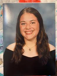 Proud parents of senior daughter attending college