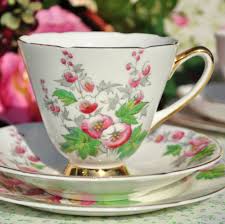 Mismatched tea cups and saucers. Old Royal Hollyhock Vintage Trio