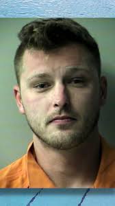 Former Navy rescue swimmer accused of trying to drown security guard in pool