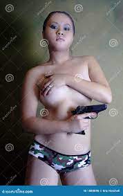 Angry, Nude Girl with a Gun Held To Her Breast Stock Photo - Image of  feeling, gloomy: 1880896