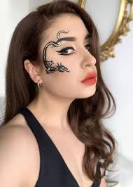 The Girl with the Drag(on) Tattoo • Sara du Jour