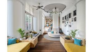 Living room designed for a couple with pets {dog and a cat}. A Delightfully Layered Home In Mumbai Dipped In Nordic Design Architectural Digest India