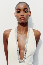 Women's White Bodysuits