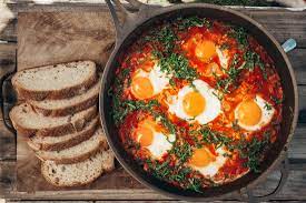 It has an extremely rich tomato base, lots of cooked onions, and delicious gooey eggs. How To Make Israeli Shakshuka Recipe And Video Touchpoint Israel