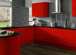 Cute apartment kitchen with red cabinets and white appliances. 15 Extremely Hot Red Kitchen Cabinets Home Design Lover