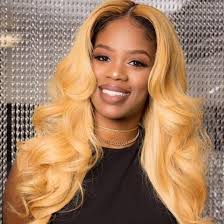 Tonya Rawls better known as “HOLLY WOOD” is a Little Rock-based hairpreneur  with national reach, specializing in life like hair extensions,  instructional DVDs, wig manufacturing and celebrity brand consulting. As  one of
