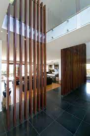 As portable room dividers go this is one of the prettier ones we've seen. Modern House Design Built Of Eco Friendly Radial Timber Modern Room Divider Wood Room Divider Room Divider Walls
