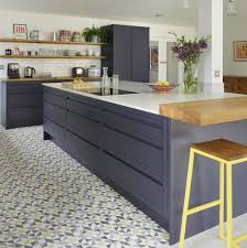 Grey worktops look great in any setting. This Dark Blue Handleless Kitchen Has Inspired Us To Embrace The Darker Evenings Blue Is An Ever Dark Blue Kitchens Blue Kitchen Inspiration Dark Grey Kitchen