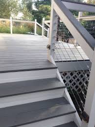 An old deck with chipped paint and splinters can detract from an otherwise inviting backyard. Deck Makeover With Sherwin Williams Flagstone In Solid Stain Cables Were Added By My Husband Deck Makeover Backyard Staining Deck