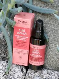 This dhathri herbal hair oil comes in a white and lime green bottle. Nutriplenish Multi Use Hair Oil Conditioning Leave In Spray Salon Soma Aveda Salon Retail Shop