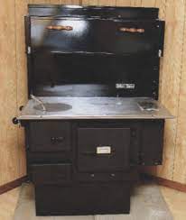All other stoves run the heat over the top of the oven and down the far side, often past a cooling surface such as a reservoir. Amish Cook Stove From Tschirhart S Bakers