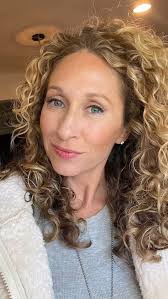 Obsessed with this fuzzy skirt. Anyone else?! #holidayseason #curlyhair