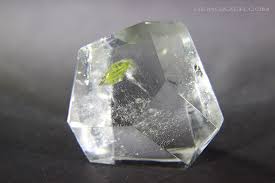 A Polished Quartz Crystal Segment With A Bright Yellow Green Sphene Crystal Inclusion A Rare Inclusion Quartz From Gemstones Precious Gemstones Rare Gemstones