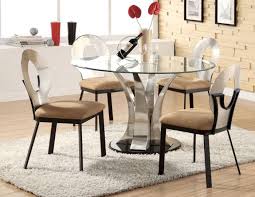 The kitchen dinette set to match up lovely in any typical kitchen or dining room. Round Table On The Kitchen Near The Wall Dining Table And Chairs For The Kitchen The Choice Of Form Round Dining Table In The Photo