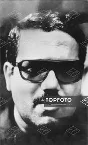 The terrorist Abu Nidal wears dark glasses. Recorded in 1983.