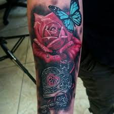 If you like locket tattoos, you might love these ideas. Rose Butterfly N Locket Locket Tattoos Leg Tattoos Girly Tattoos