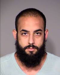 ARMED ROBBERY W/APPREHENSION: 7255 N Keystone Ave, GameStop The suspect  entered the store and lingered until he was the only non-employee present.  At this point the suspect approached the checkout counter revealing